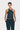 a female model wearing black yvy leather halter neck top and black pants
