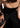 woman wearing black midi leather yvy skirt featuring plisse fabric detail 