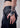a woman wearing yvy asymmetric black leather hand accessory with leather straps 